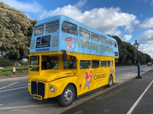 a double decker bus parked on the side of a road