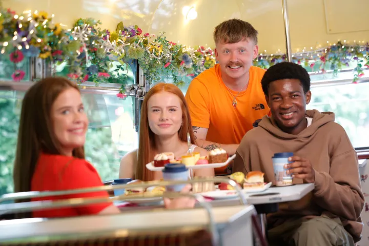 a group of people sitting at a table