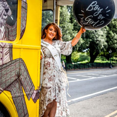 gender reveal party - woman with a balloon