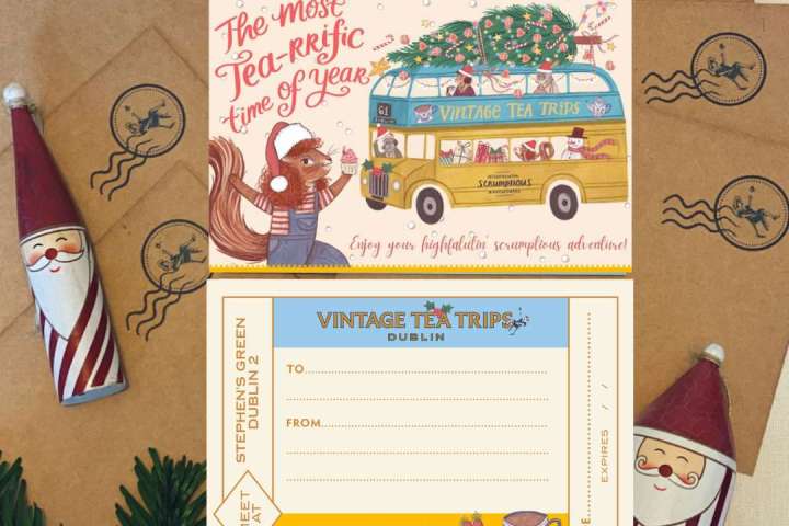 Festive card with vintage bus, tea theme, and gift tags on brown paper with Santa figurines.