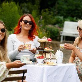 a woman sitting on a table