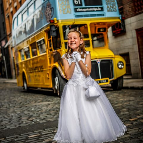 a double deckered bus on a city street