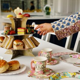 hand reaching for some afternoon tea