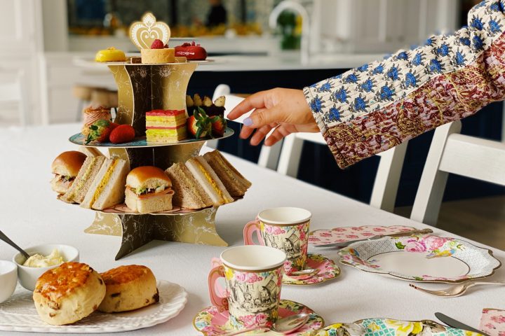 hand reaching for some afternoon tea