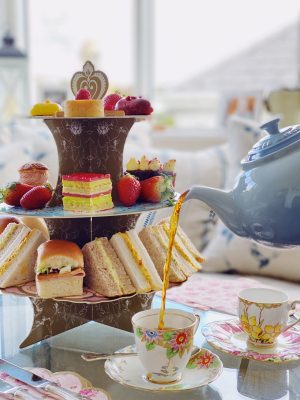 tea being poured into a cup