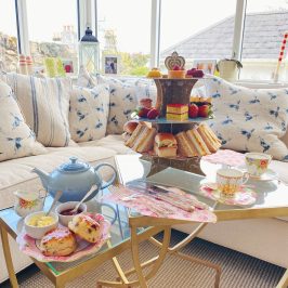 Afternoon tea set up in a cosy sitting room