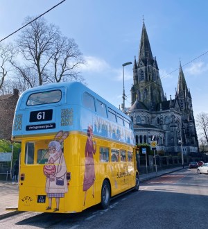 a double decker bus parked on the side of a road