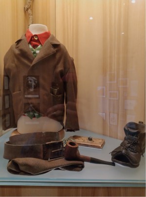 a person standing in front of a mirror posing for the camera