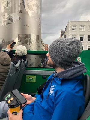 a man sitting on a bus