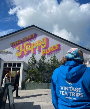 a group of people standing in front of a building