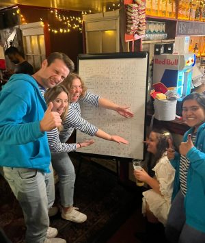 a group of people standing in a room