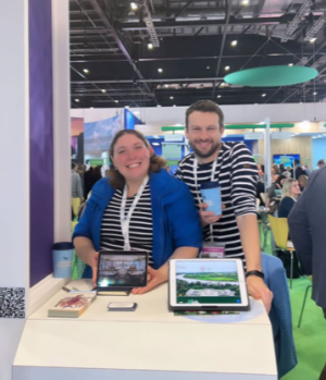 a group of people standing in front of a store