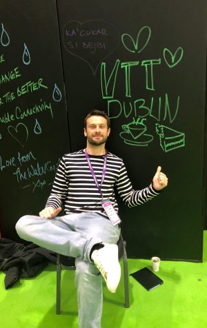 a person sitting on a blackboard