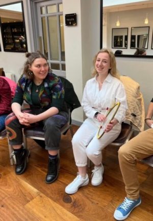 a group of people sitting at a table