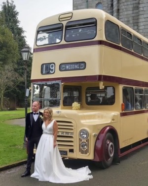 a double decker bus parked on the side of a road