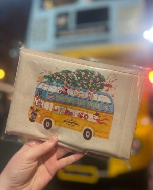 a hand holding a camera