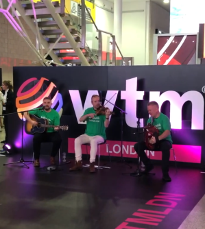 a group of people standing in a room