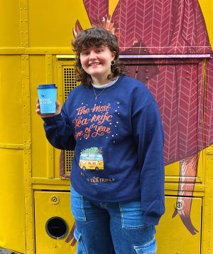 a man standing in front of a building
