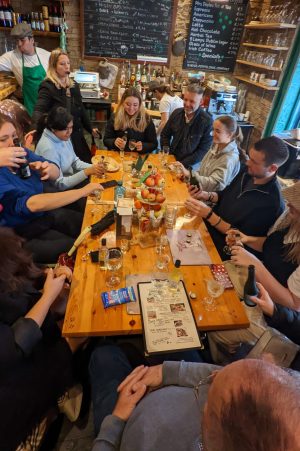 a group of people sitting at a table