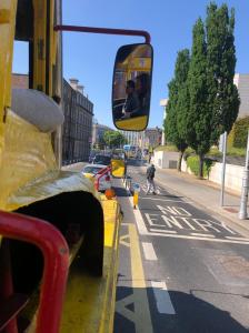 a bus that is sitting on the side of a road