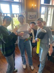 a group of people standing in a room