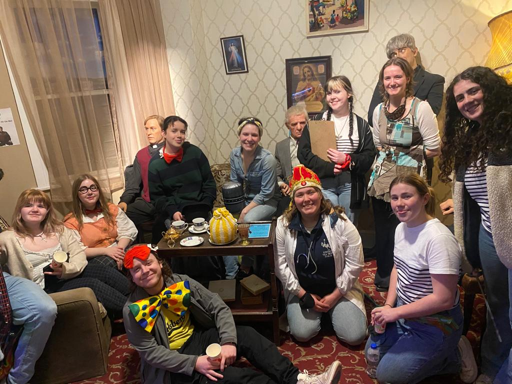 a group of people posing for the camera