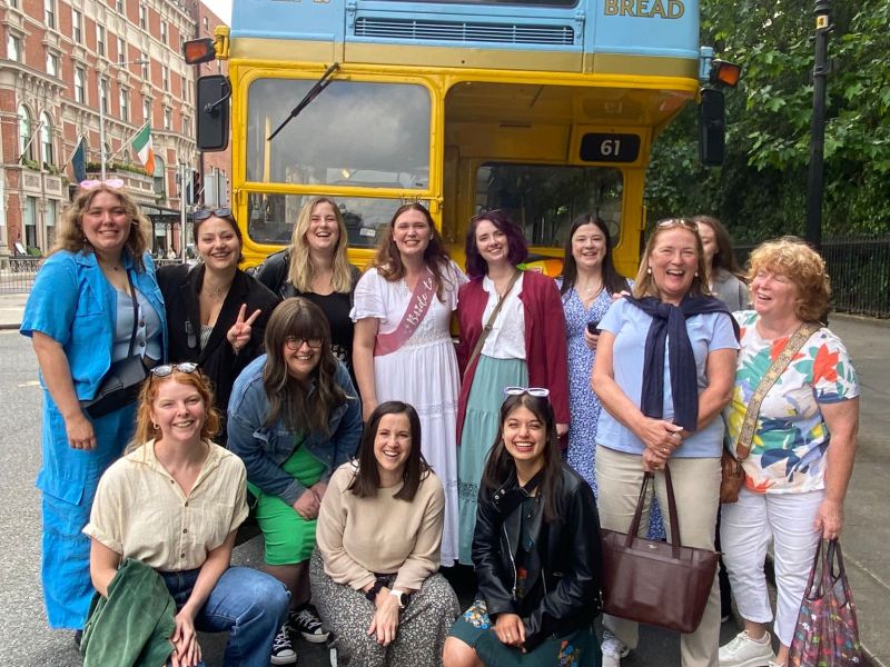 hen party dublin vintage tea trips a hen party of people standing in front of a bus