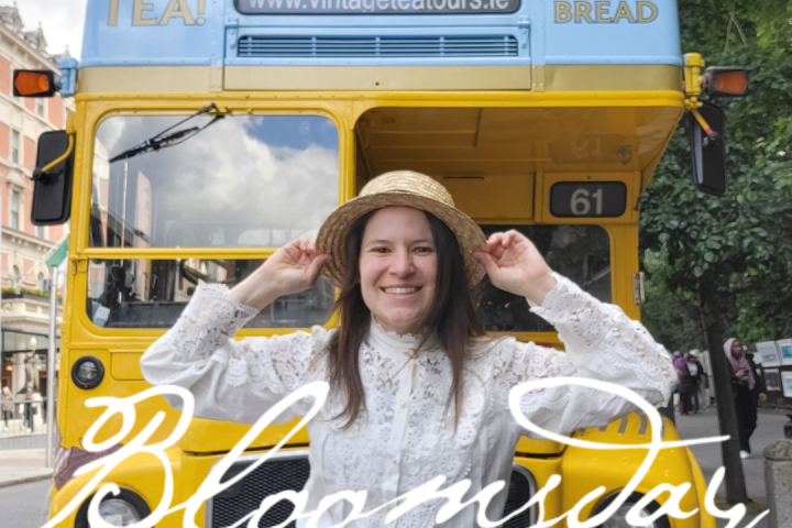 a person riding on the back of a bus
