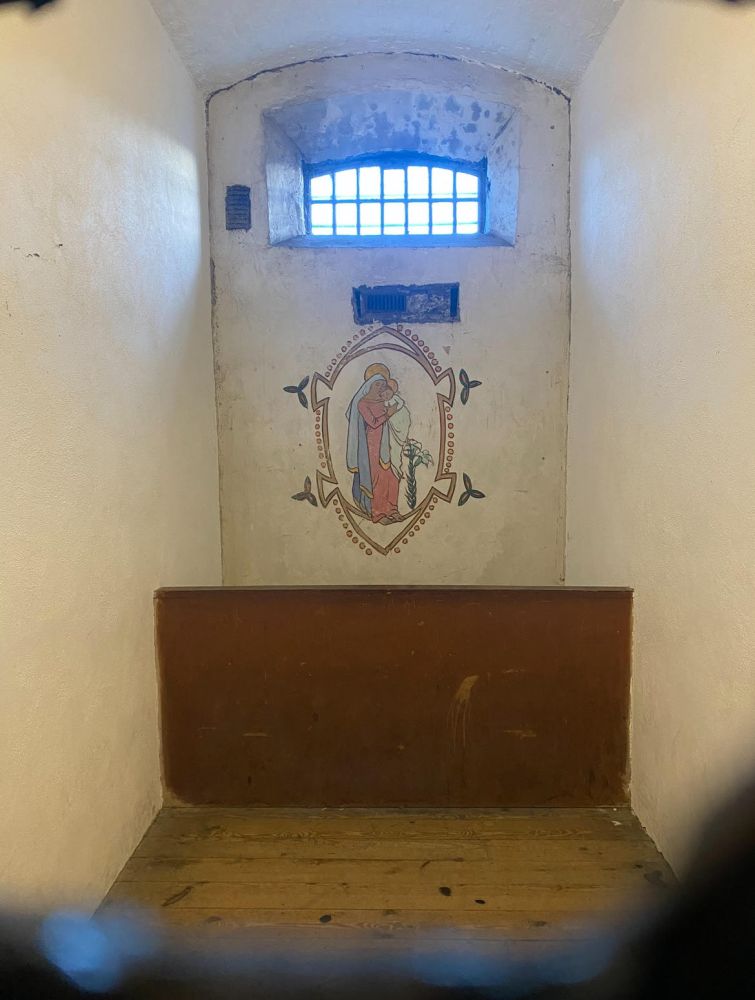 a close up of a painted wall in Grace Gifford's Jail cell in Kilmainham Jail