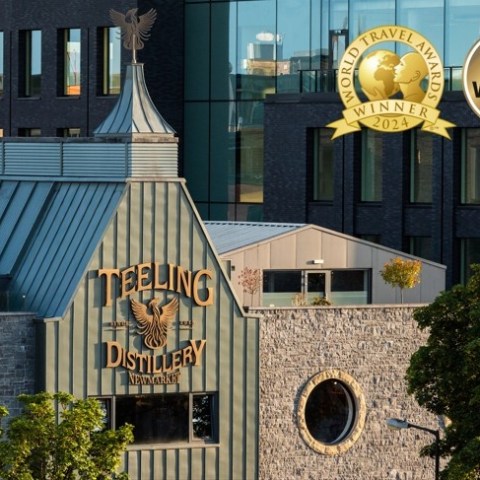 a clock sitting in front of a building