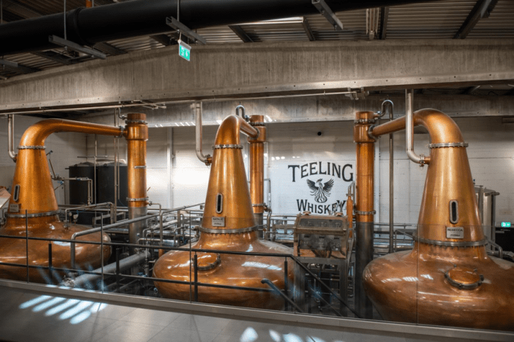 a large kitchen with stainless steel appliances