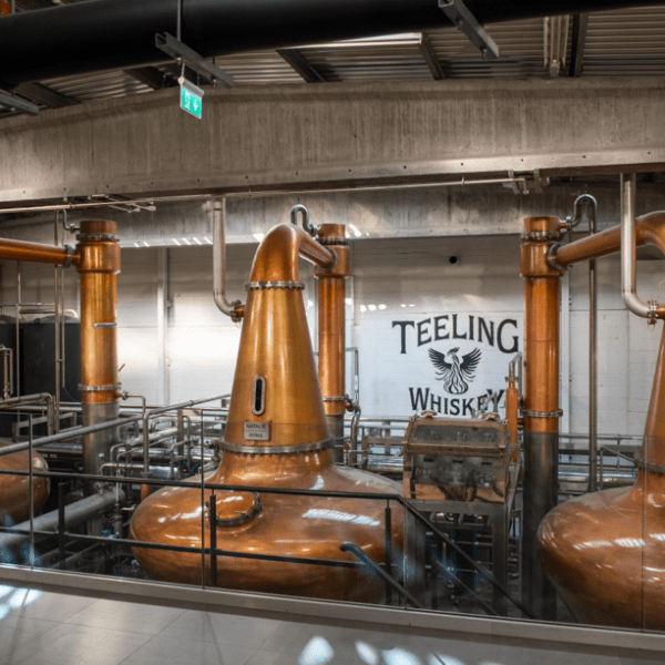 a large kitchen with stainless steel appliances