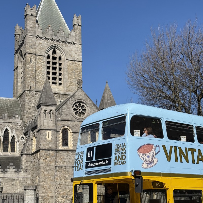 a double decker bus parked in front of a building
