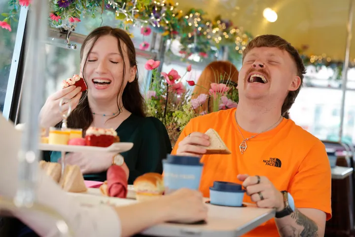 a man and a woman sitting at a table