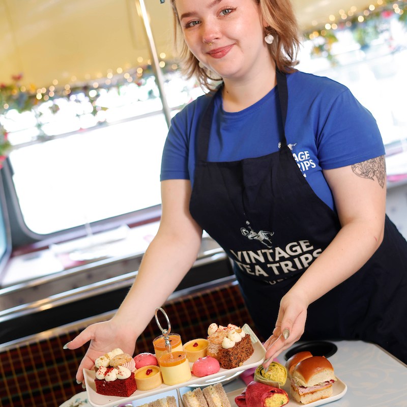 Rebecca Grimes sitting at a table with a plate of food
